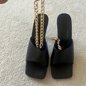 Black heels with chain strap